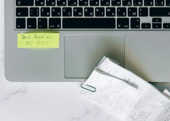 Construction budget planning with financial documents and calculator